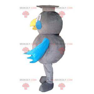 Mascotte uccello grigio e blu. Mascotte laureata -