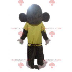 Brązowa małpa maskotka wyglądająca zaciekle - Redbrokoly.com