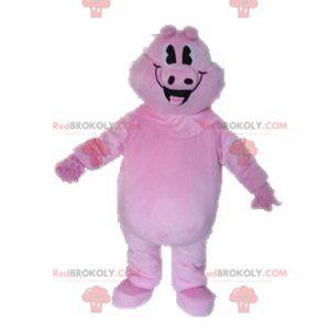 Gigantyczna i uśmiechnięta różowa maskotka świni -