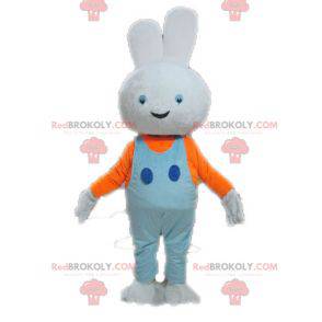 Mascotte de lapin blanc avec une salopette bleue -