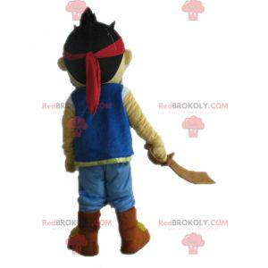 Bruine jongen mascotte gekleed als een piraat - Redbrokoly.com