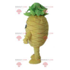 Mascotte d'ananas jaune et vert géant. Mascotte de fruit -