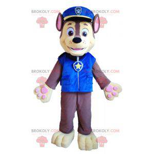 Brown and yellow dog mascot in police uniform - Redbrokoly.com