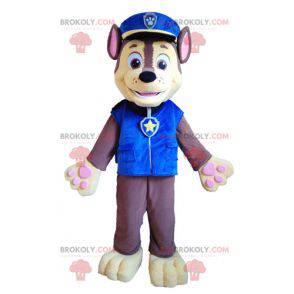 Braunes und gelbes Hundemaskottchen in Polizeiuniform -