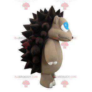 Graues und braunes Igelmaskottchen mit hübschen blauen Augen -
