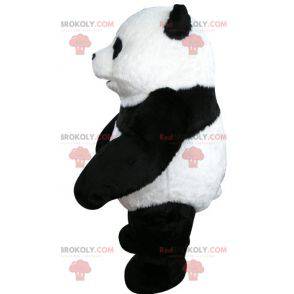 Sehr schönes und realistisches Schwarz-Weiß-Panda-Maskottchen -