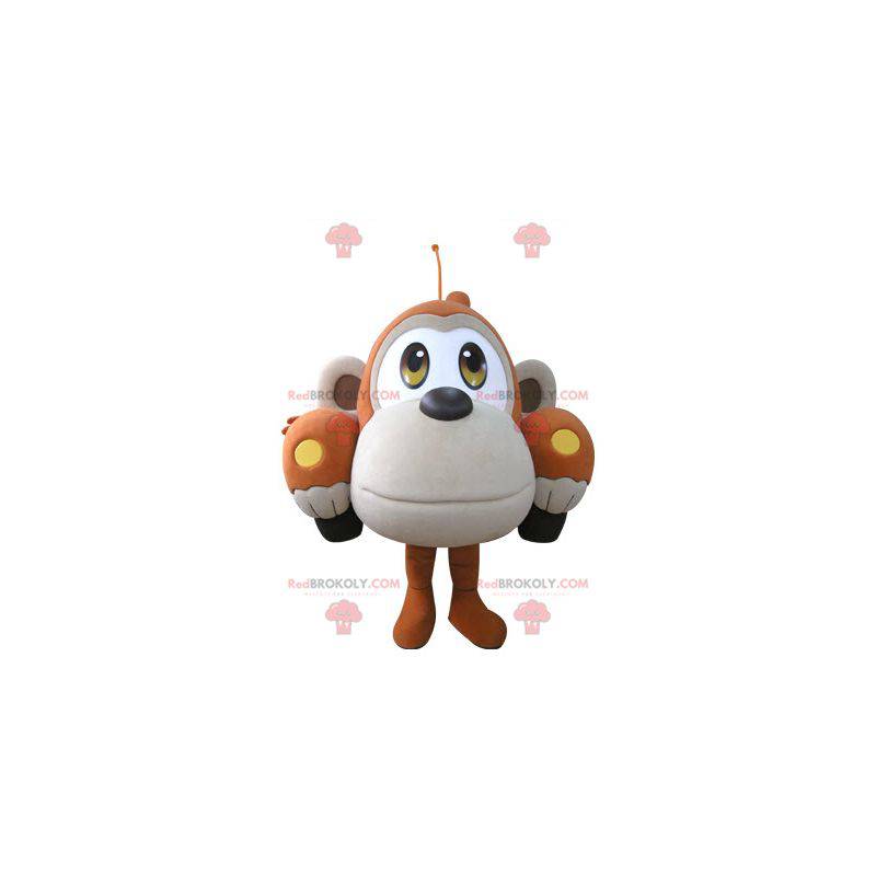 Mascota del coche con forma de mono naranja y beige. - Mascota del coche con forma de mono naranja y beige. -