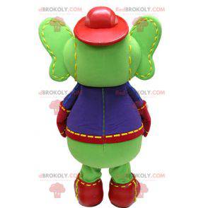 Mascotte elefante verde e giallo in abito blu e rosso -