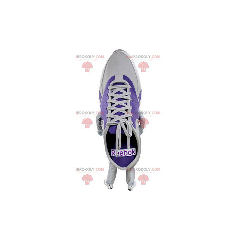 Mascotte de chaussure violette et blanche. Mascotte de basket -