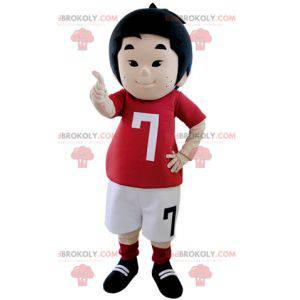 Menino mascote vestido com roupa de jogador de futebol -