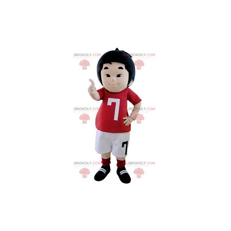 Kleine jongen mascotte gekleed in voetballer outfit -