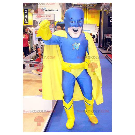 Mascotte de super-héros en combinaison jaune et bleue -