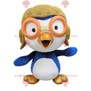 Mascotte blauwe en witte vogel in vliegersuitrusting -