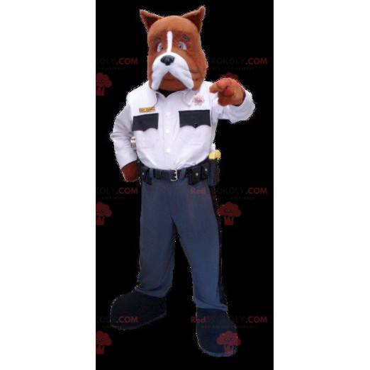 Mascotte cane marrone e bianco in uniforme della polizia -