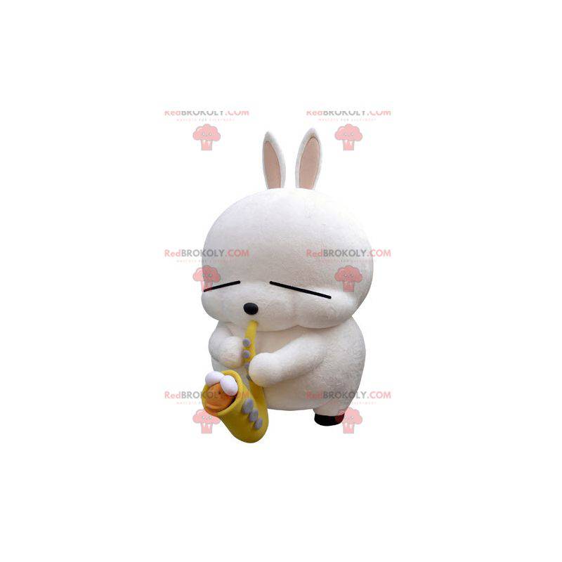 Mascotte grande coniglio bianco con un sassofono -