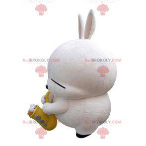 Grote witte konijn mascotte met een saxofoon - Redbrokoly.com