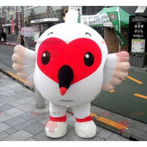 Mascote grande pássaro branco com um lindo coração vermelho -