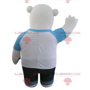 Mascotte d'ours blanc et noir habillé en bleu et blanc -