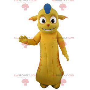 Mascote monstro amarelo e laranja com orelhas pontudas -