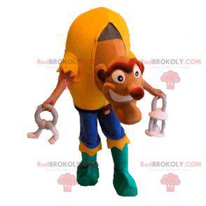 Monster Buckliges Maskottchen mit einem bunten Outfit -