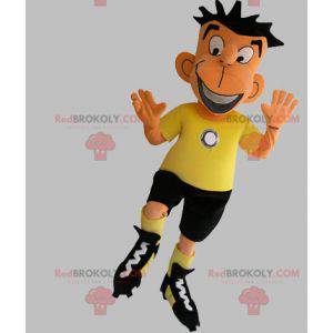Mascota del futbolista en traje negro y amarillo -