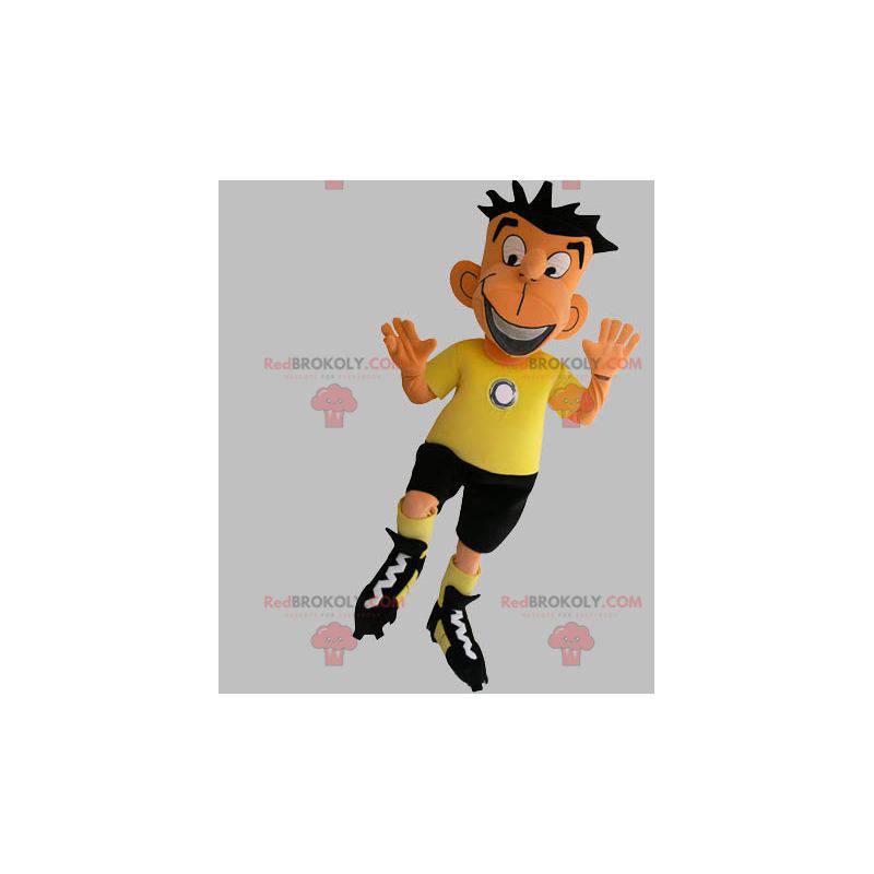 Fotbollsspelare maskot i svart och gul outfit - Redbrokoly.com