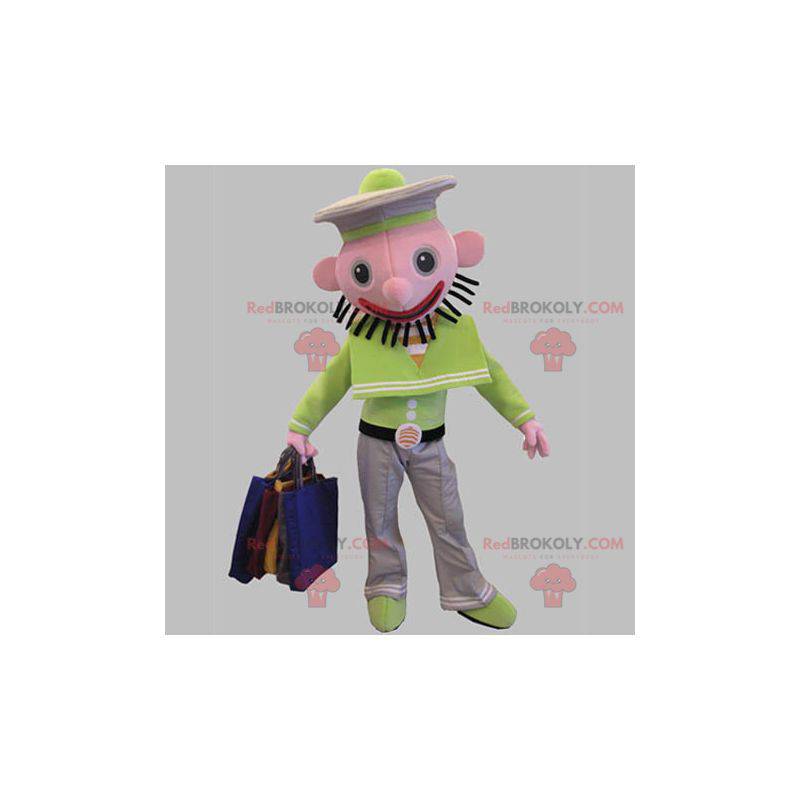 Mascota marinero verde y blanco con cabeza rosada -