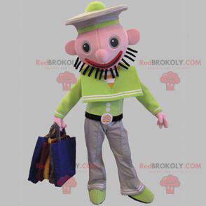 Grön och vit sjömaskmaskot med rosa huvud - Redbrokoly.com