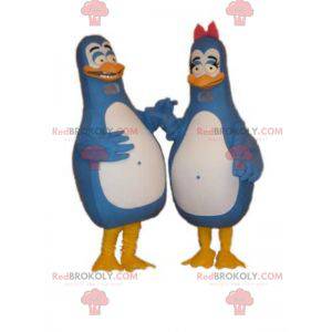 2 mascottes de pingouins bleus et blancs. Mascottes de couple -