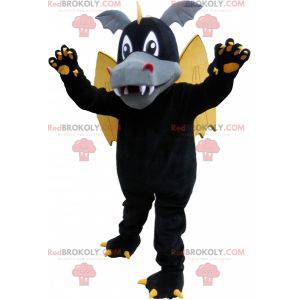 Mascote dragão de asas negras com orelhas e garras -