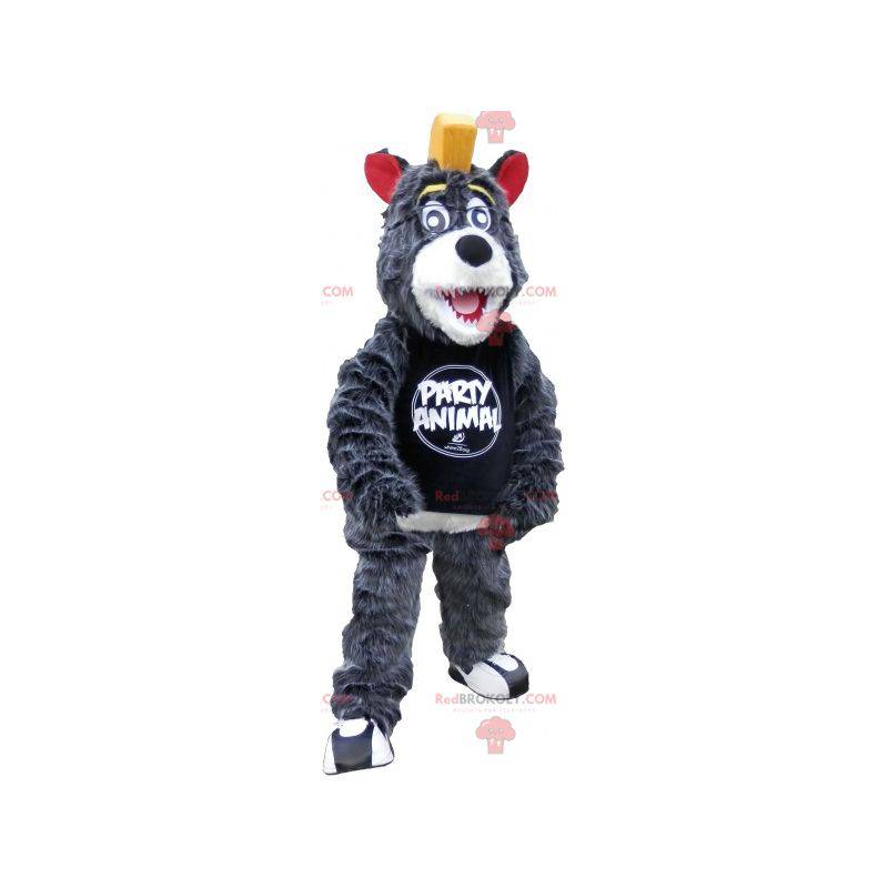 Mascot oso gris y blanco con una cresta amarilla -