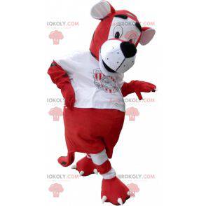 Mascota del tigre en traje de futbolista rojo y blanco -