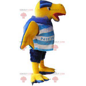 Mascote abutre amarelo e azul em roupas esportivas -