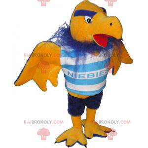 Mascotte de vautour jaune et bleu en tenue de sport -