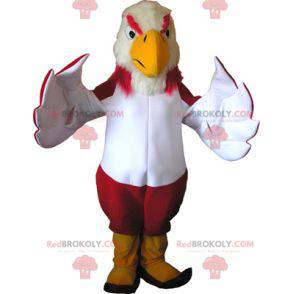 Colorful vulture mascot with yellow boots - Redbrokoly.com