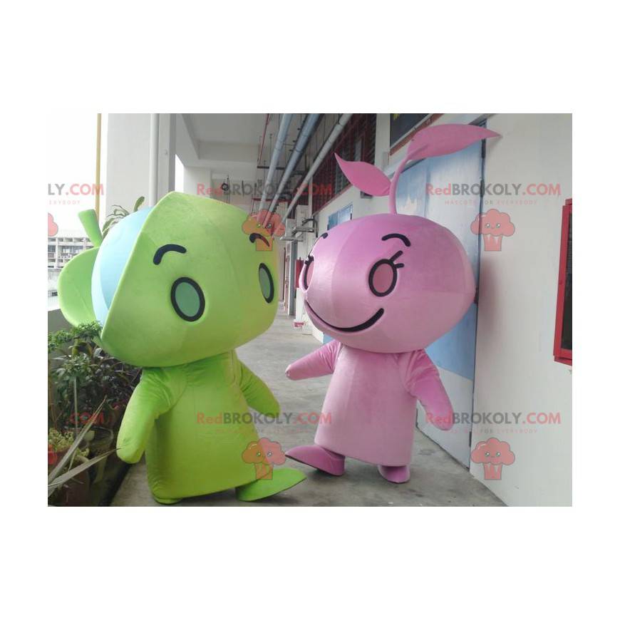 2 mascotas de muñecos de nieve gigantes verdes y rosas -