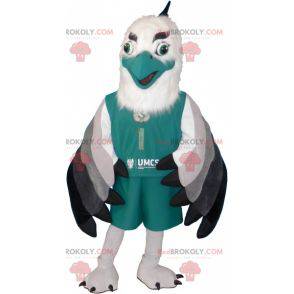 Mascotte d'oiseau blanc et vert en tenue de sport -