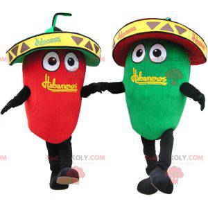 2 mascotes gigantes de pimenta verde e vermelha. Casal mascote