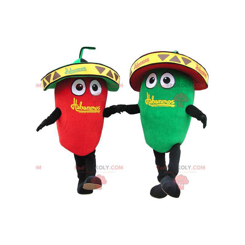 2 mascotes gigantes de pimenta verde e vermelha. Casal mascote