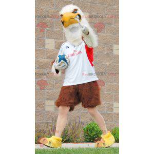 Mascotte d'aigle marron et blanc géant en tenue de sport -