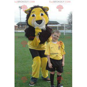 Mascotte de lion jaune noir et blanc tout poilu - Redbrokoly.com