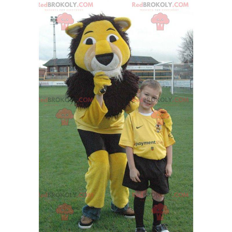 Mascotte de lion jaune noir et blanc tout poilu - Redbrokoly.com