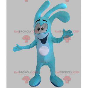 Mascotte de bonhomme bleu souriant. Mascotte de lapin bleu -