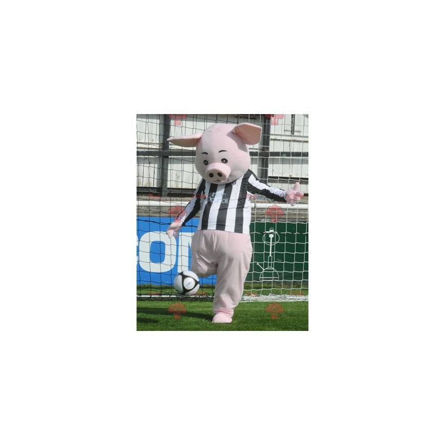 Mascotte de cochon rose avec un maillot noir et blanc -