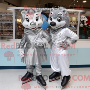 Sølv par skøyter maskot...