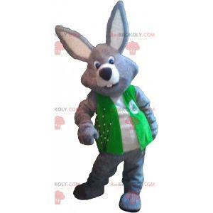 Mascotte de lapin géant gris et blanc portant un gilet -