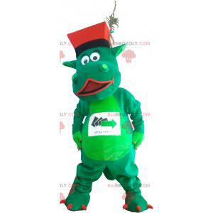 Mascote dinossauro verde com chapéu - Redbrokoly.com