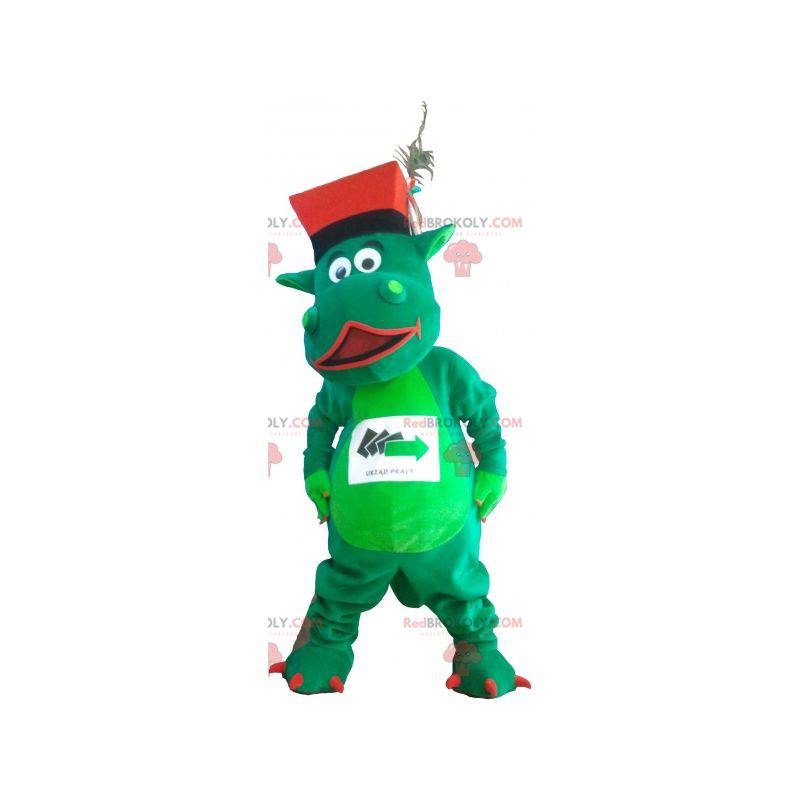 Zelený dinosaur maskot s kloboukem - Redbrokoly.com