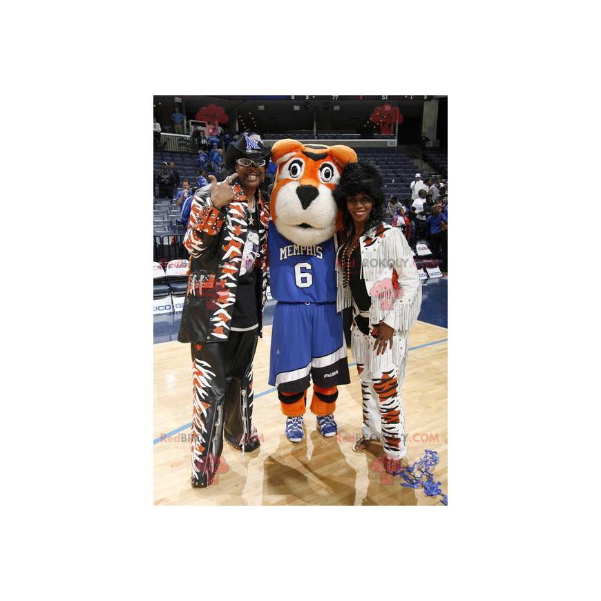 Mascotte de tigre sportif orange blanc et noir en tenue bleue -