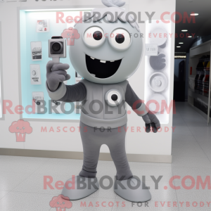 Postava maskota šedé kamery...